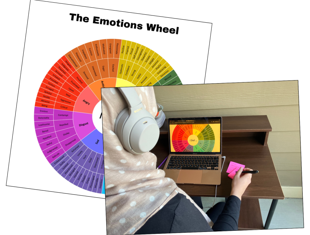 Ikra writing on a sticky note pad with with the Emotions Wheel diagram showing on her screen